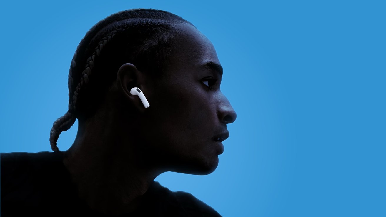 Person wearing AirPods 4 with a blue background