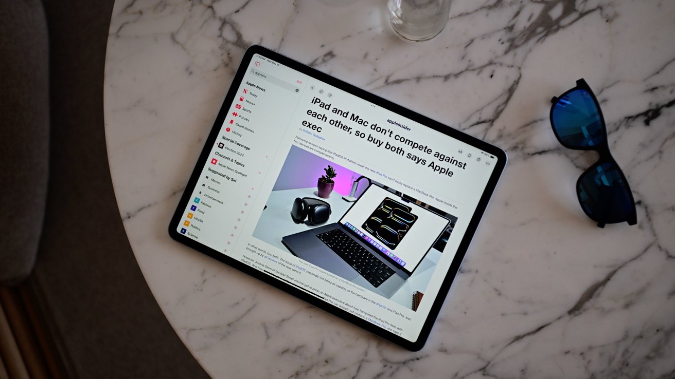 iPad Air on a table with an article showing on screen from Apple News