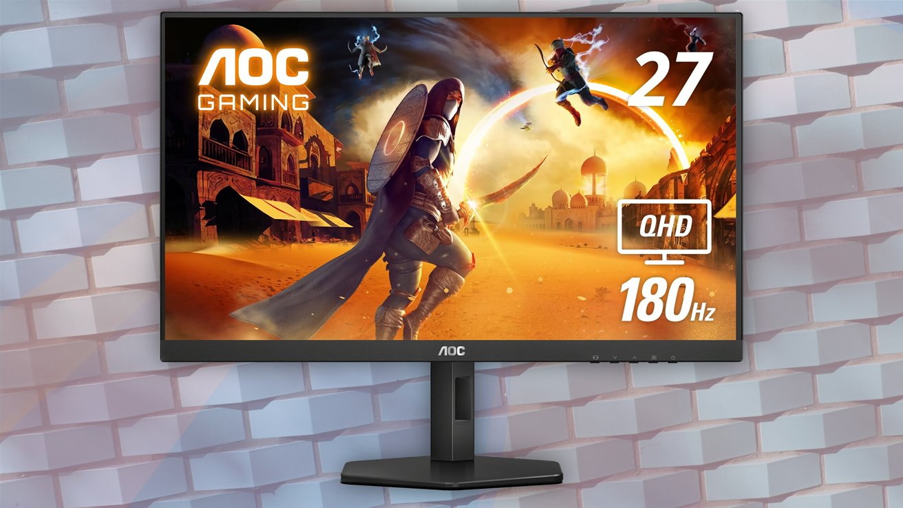 AOC gaming monitor displaying a warrior in a desert city, battling airborne enemies under a bright sky. Text indicates 27-inch size, QHD resolution, and 180Hz refresh rate.