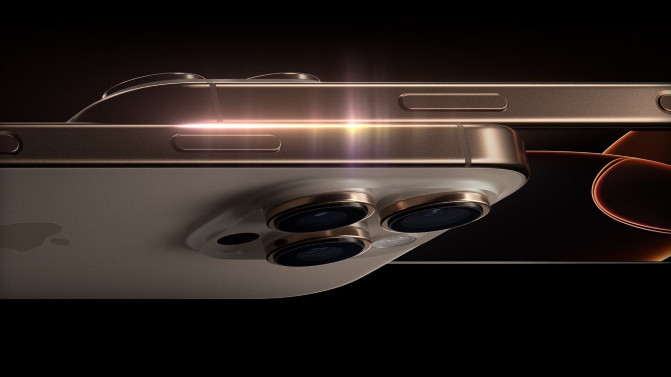 Close-up of a gold smartphone with three camera lenses against a dark background, featuring a glowing light flare.