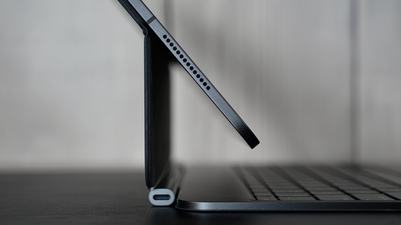 iPad Pro on a Magic Keyboard turned out the side to show the thin profile