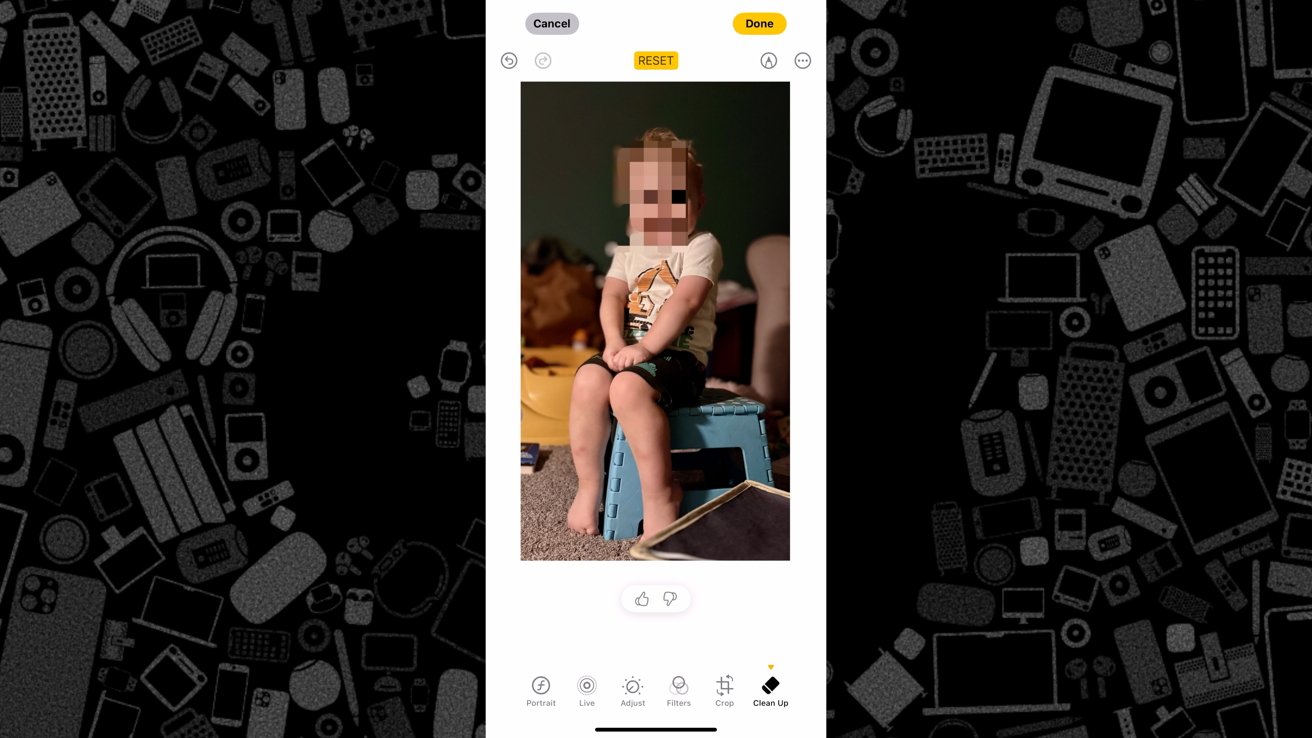 A screenshot of a photo with a child and his face blurred