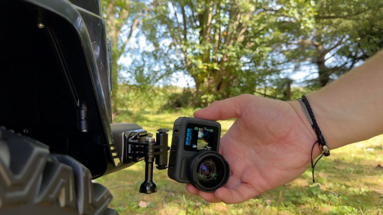 Placing the GoPro Hero 13 Black on a magnetic mount that is stuck to the bumper of a kids toy Jeep