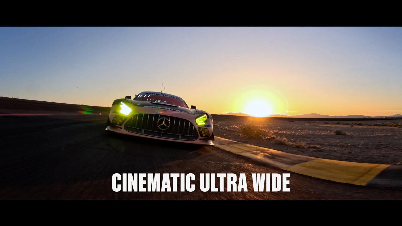 A race car on a track shot in 12:9 ultra wide