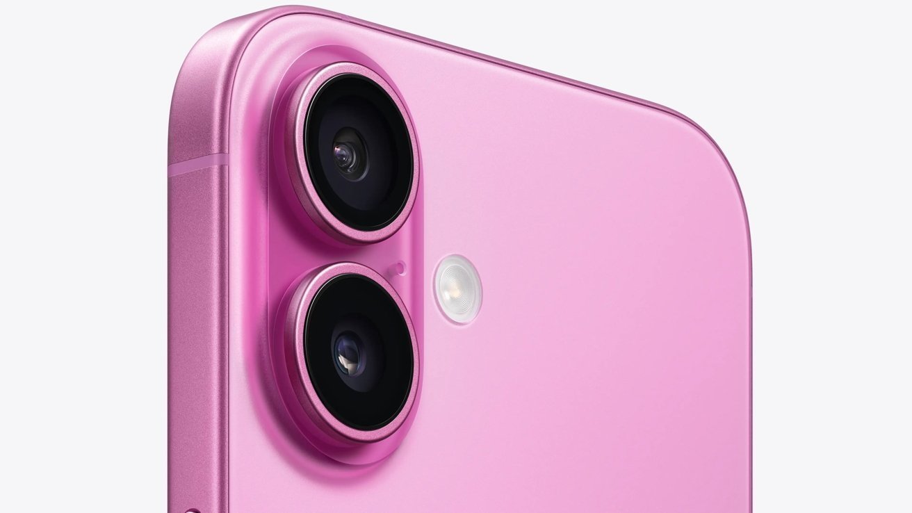 Close-up of a pink smartphone's dual camera and flash.