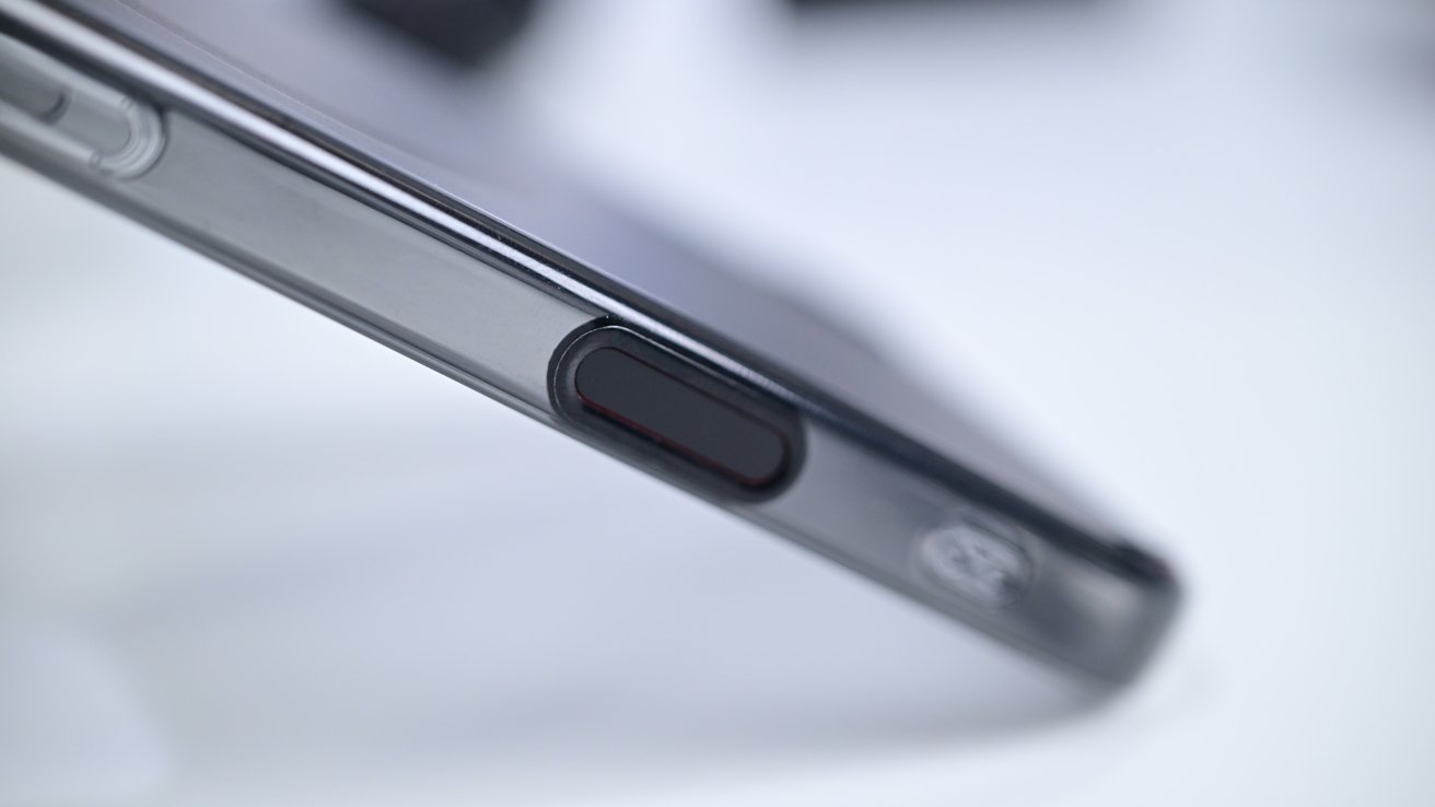 A closeup of the Spigen case with a black button covering the presumed capture button