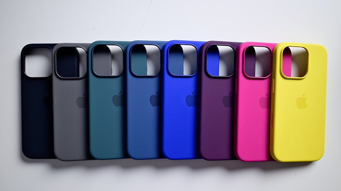 Apple's silicone cases laid down on a white table to show all the colors