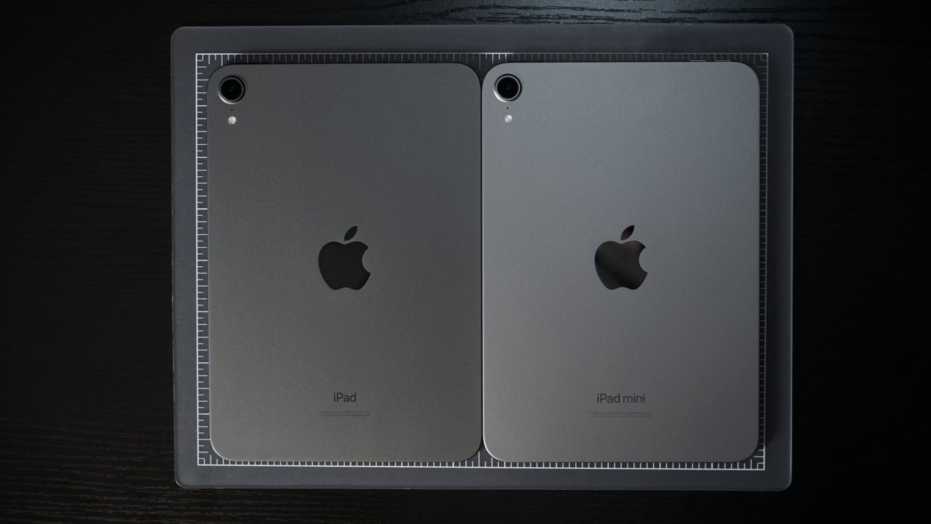 Two Apple devices, an iPad and an iPad mini, placed side-by-side on a dark surface with a grid outlining their sizes.